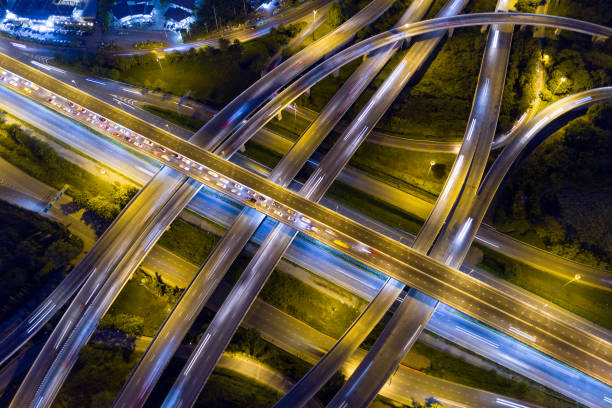 istock Aerial view of road interchange at night 1175973854
