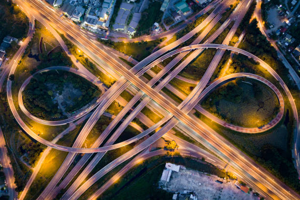 istock Aerial view of road interchange at night 1175973956