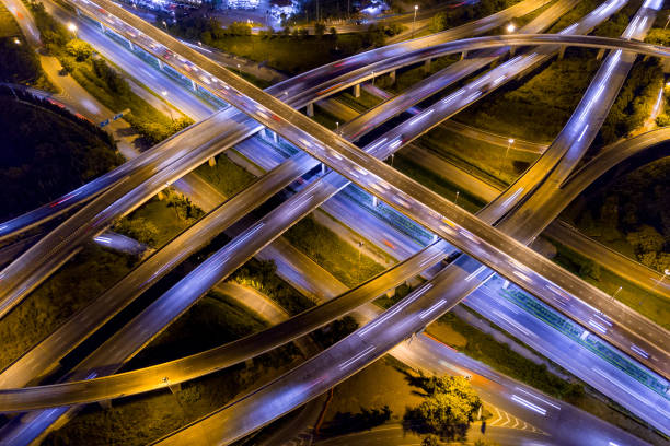 istock Aerial view of road interchange at night 1175973961