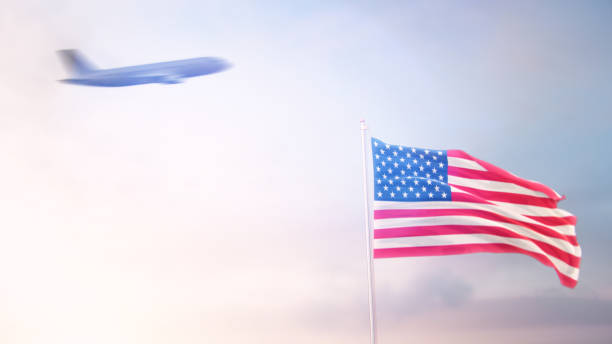 istock USA Flag With Airplane At Background 1175974237