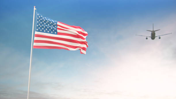 istock USA Flag With Airplane At Background 1175974243
