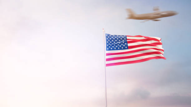 istock USA Flag With Airplane At Background 1175974350