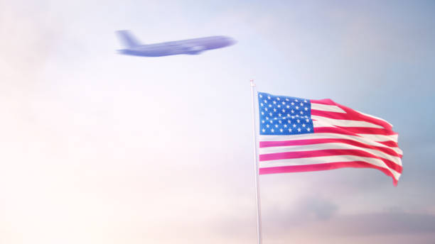 istock USA Flag With Airplane At Background 1175974382