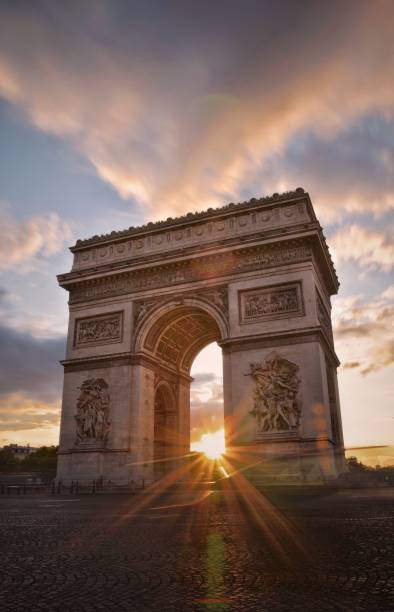The Arch de Triomphe The art of Paris, the Arch de Triomphe on Champs Élysées was looking gorgeous on a sunset with some smoothest clouds. arc de triomphe paris stock pictures, royalty-free photos & images