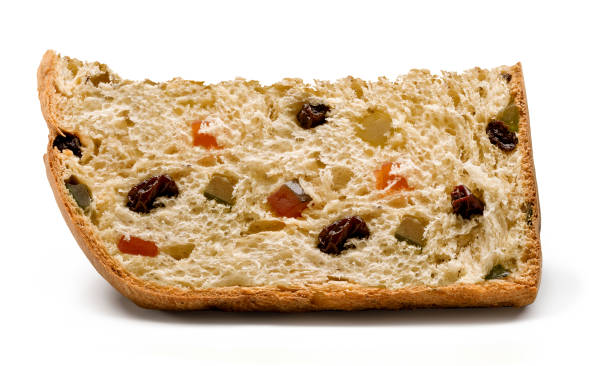a slice of panettone, with candied fruits and raisins - fruitcake cake fruit dessert imagens e fotografias de stock