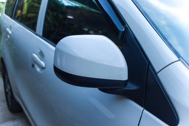 istock Car Rear View Mirrors parked on the nature of different colors from different angles 1175981885