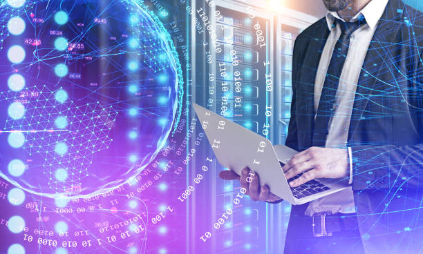 istock Man with laptop in data center, digital planet 1175991442