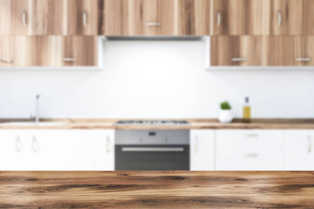 istock Close up of white kitchen countertops, blurred 1175996348