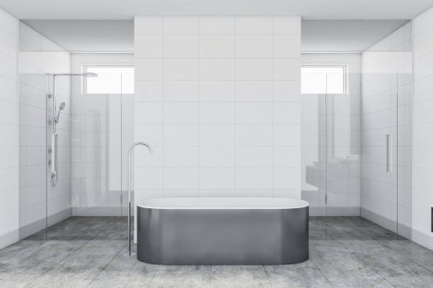 istock White tile bathroom interior with tub and shower 1175996457