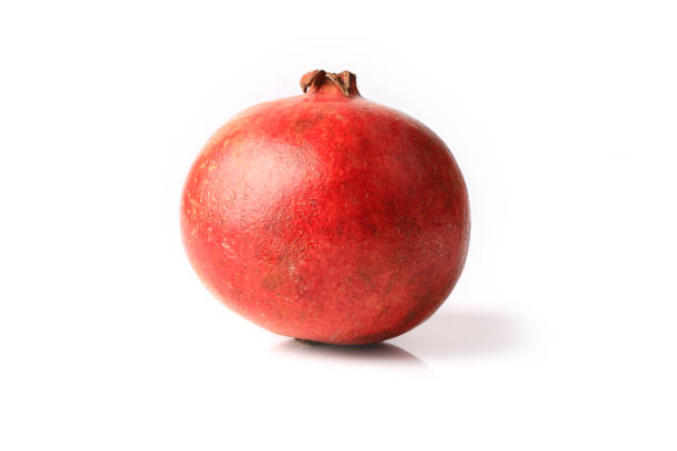 istock whole pomegranate isolated on white background 1175996729