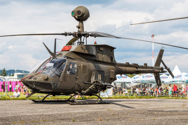 Croatian Air Force Bell OH-58D Kiowa Warrior 324 attack helicopter static display at SIAF Slovak International Air Fest 2019 Sliac / Slovakia - August 3, 2019: Croatian Air Force Bell OH-58D Kiowa Warrior 324 attack helicopter static display at SIAF Slovak International Air Fest 2019 kiowa stock pictures, royalty-free photos & images