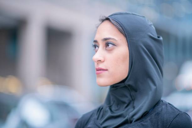 istock Muslim woman prepares to go on a run 1175998314