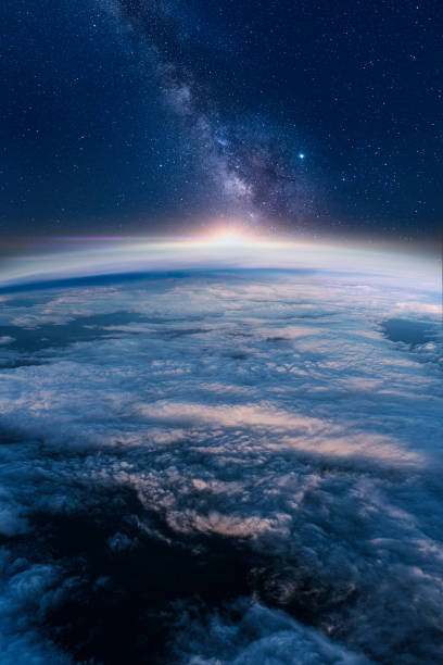 Milky way rising over the Earth's horizon View of stars and milky-way above Earth from space space exploration photos stock pictures, royalty-free photos & images