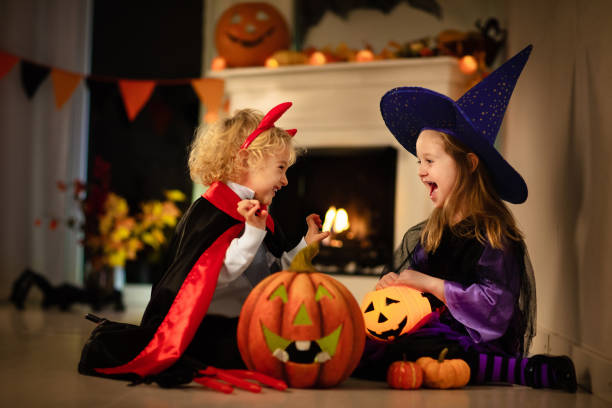 istock Kids in witch costume on Halloween trick or treat 1176010742