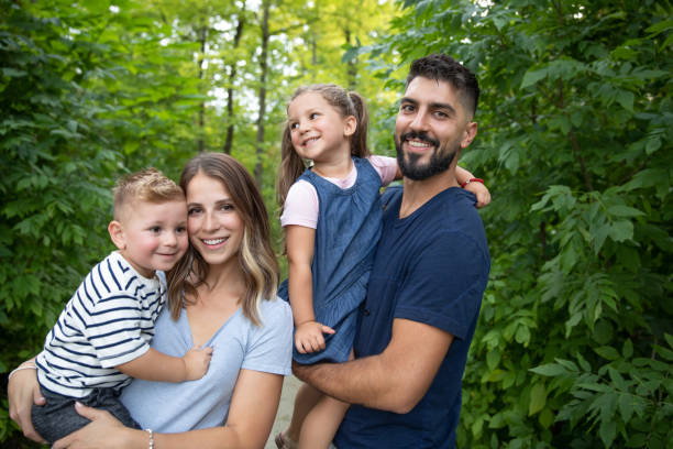 istock Happy Young Family with Two Children 1176010768