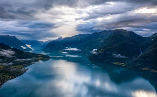 lustrafjord mit dramatischem himmel - nes stock-fotos und bilder