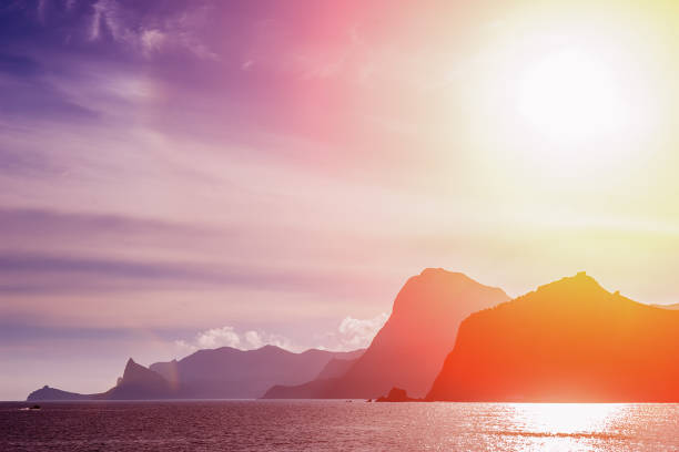 istock Beautiful mountains on the sea at sunset 1176019336