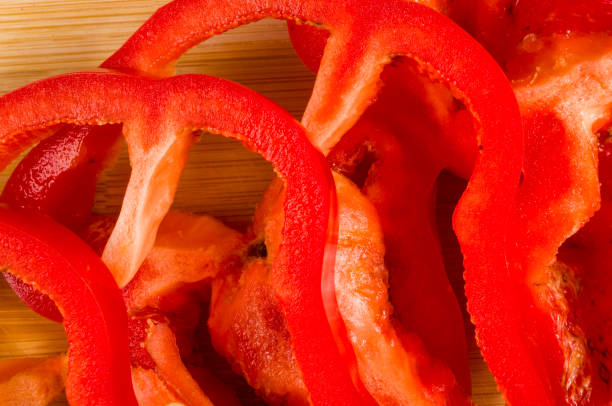 istock sliced fresh red paprika, bell pepper on bamboo cutting board 1176023860