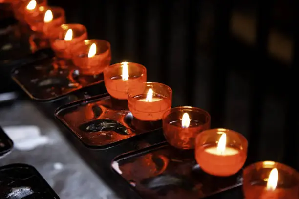 Photo of Candles lit lourdes