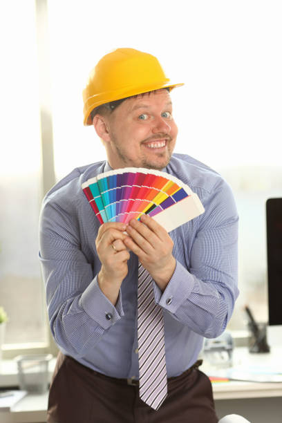 istock Interior Designer Hold Fanned Out Color Palette 1176032366