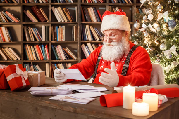 Santa Claus in the library christmas new year concept stock photo