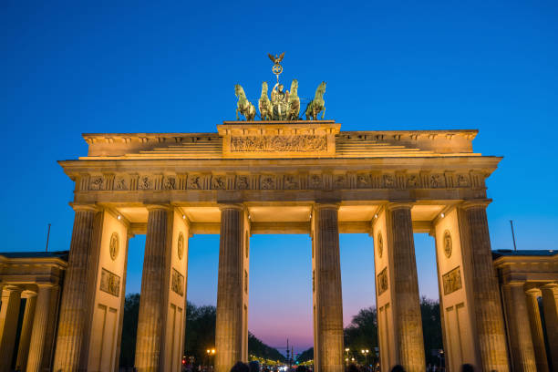 istock The Brandenburg Gate in Berlin at night 1176032710
