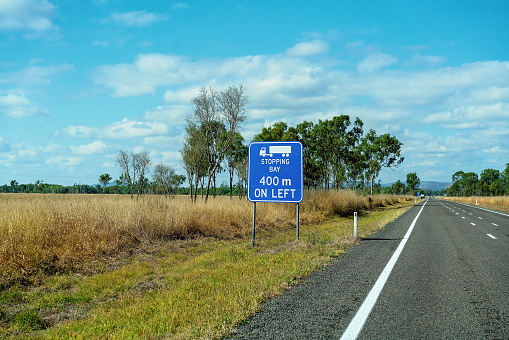 A truck stopping bay sign on an Australian country highway to encourage drivers to rest