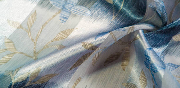 istock texture, pattern, background. This beautiful fabric is decorated with metallic silver lurex with an abstract pattern, which creates a great visual interest. Ideal for adding elegance to your designs 1176033818