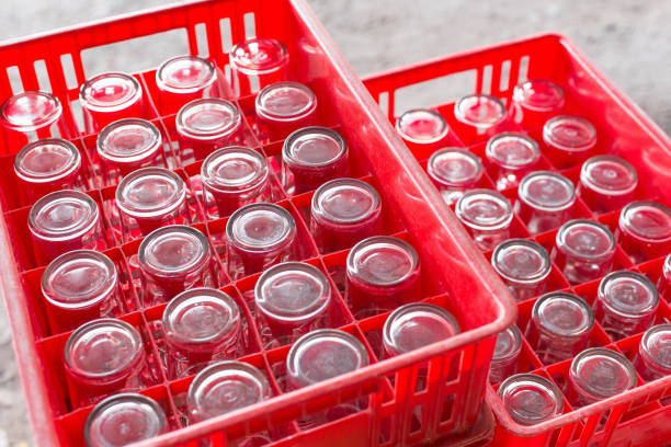 istock Selective focus of Drinking glass in red plastic crates 1176041181