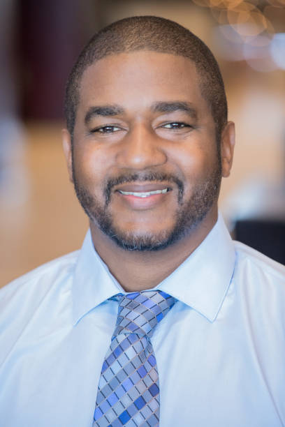 istock Handsome African American man smiling for portait 1176047722