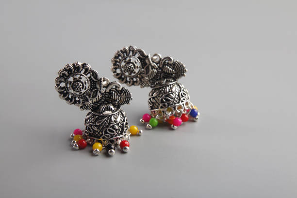 Pair of black metal earring with beads
