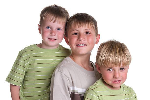 A young business group of children stand on a stage looking through binoculars ready to search for new solutions and strategy for your business. 