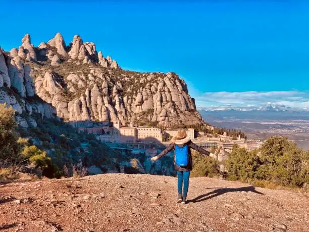 Girl enjoying a mountain view