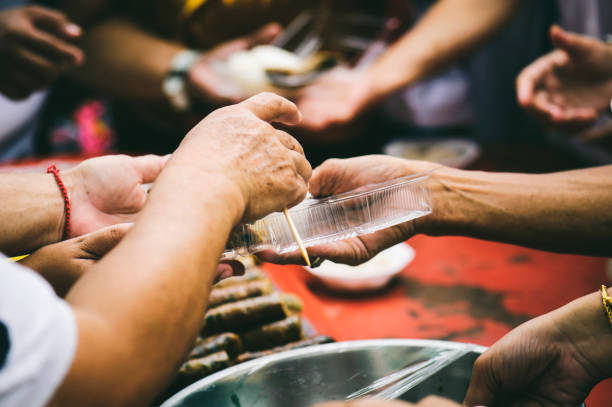 istock Starvation issues help with food donations: concept of giving 1176067118
