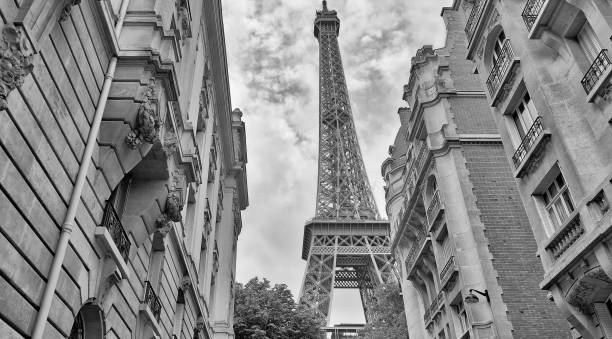 istock The Eiffel Tower between city buildings, Paris 1176071634