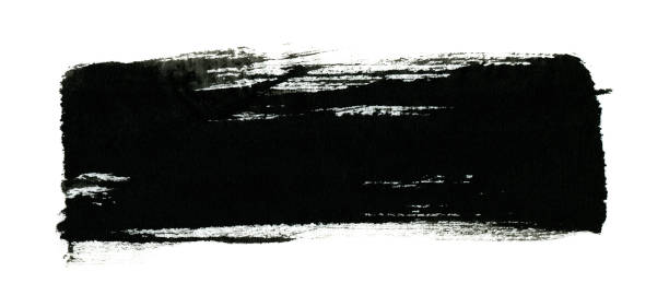 istock Black color paint with brush stroke isolated on white background 1176073568