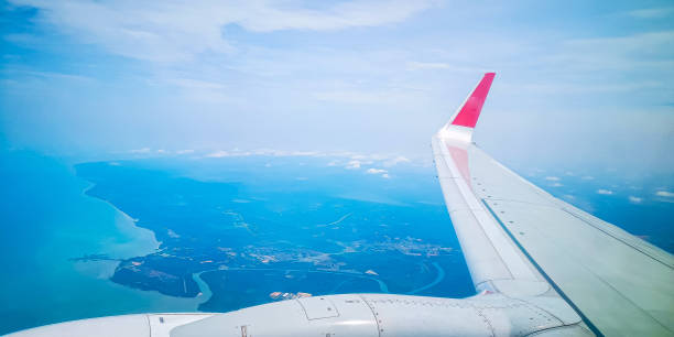 istock Airplane wing over the sky background, 1176074581