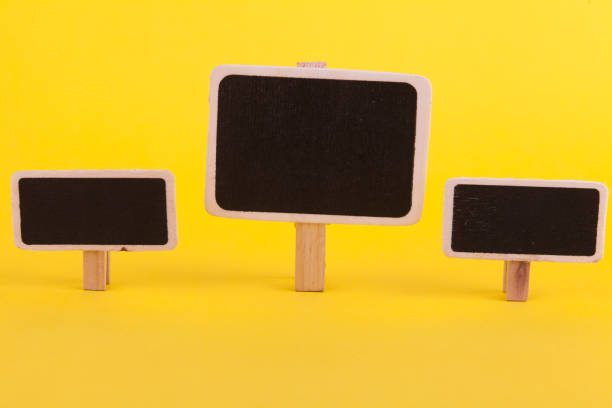 istock Information board on the stand on a yellow background 1176079006