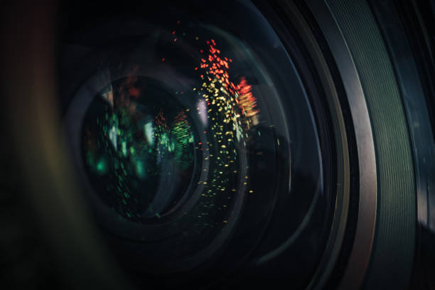 istock Beautiful camera aperture lens with multi colored shine glass reflection. Macro view. 1176080366