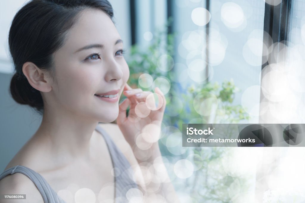 Beauty concept of a young asian woman. Skin care. Body care. Cosmetics. Women Stock Photo