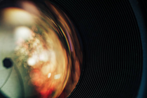 istock Close up beautiful camera aperture lens with multi colored light glass reflection. Macro view. 1176080815
