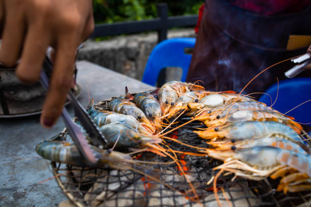 istock Grilled shrimp on a charcoal stove 1176080830