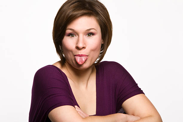 istock Woman sticks tounge out 117608192