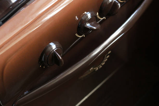 istock Brown switch on the electric stove close-up. 1176085567