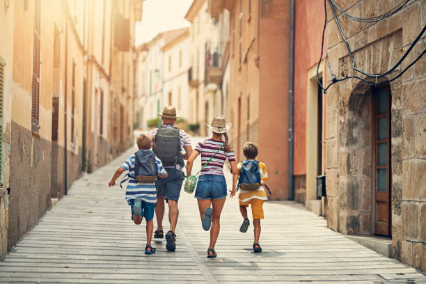 istock Family visiting mediterranean town on Majorca 1176087511