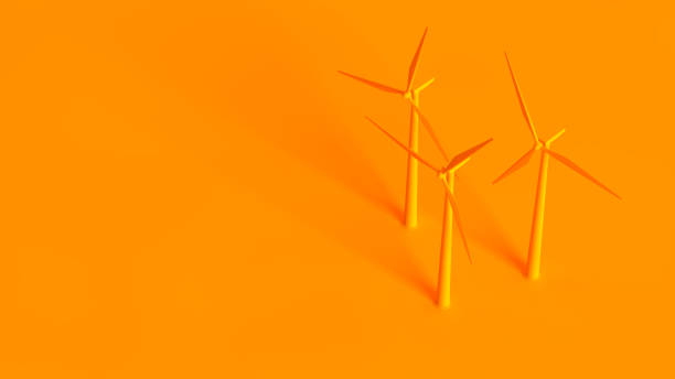 Renewable energy sources conceptual image. Wind turbine isolated on orange background. Renewable energy sources conceptual image. Wind turbine isolated on orange background. brics photos stock pictures, royalty-free photos & images