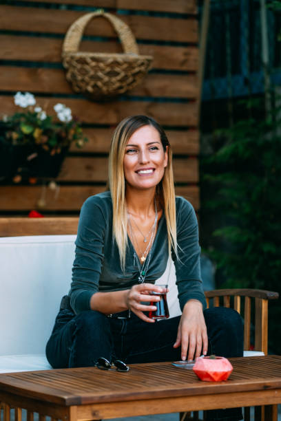 istock Blond Woman Drinking Turkish Tea 1176088405