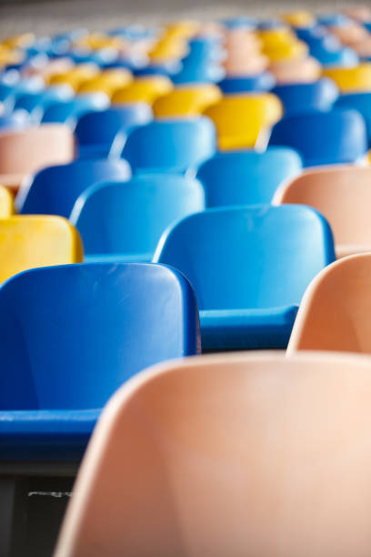 istock Stadium seats outdoor in sunny day 1176088674