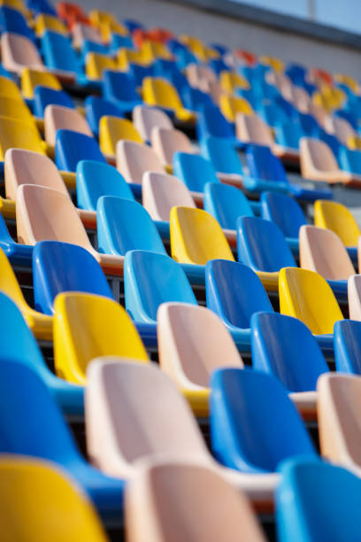 istock Stadium seats outdoor in sunny day 1176088684