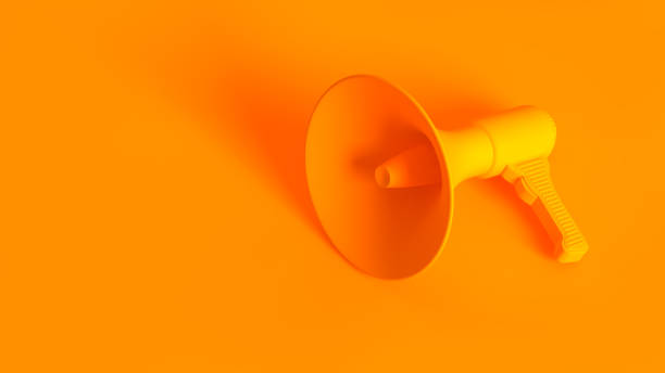 istock Portable wireless megaphone. Conceptual stereoscopic image full toned in orange color. 1176088836